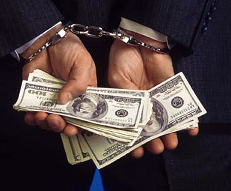 Попался на взятке в $900 тыс.