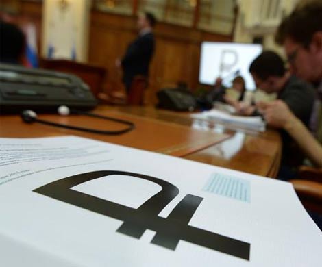 Дешевеющая нефть потянула за собой рубль