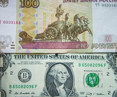 Доллар вплотную приблизился к 80 руб.
