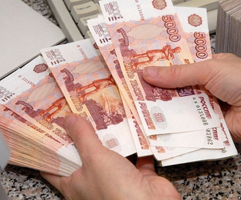 Объем обналичивания денег  в России в прошлом  году сократился на треть