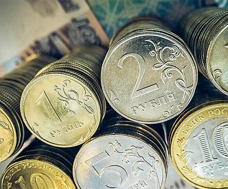 Рубль на ММВБ пытается укрепиться