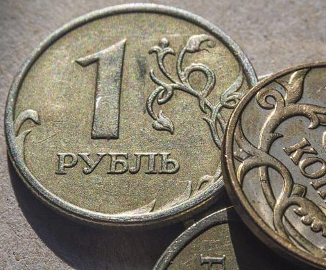 Рубль растет вслед за нефтью