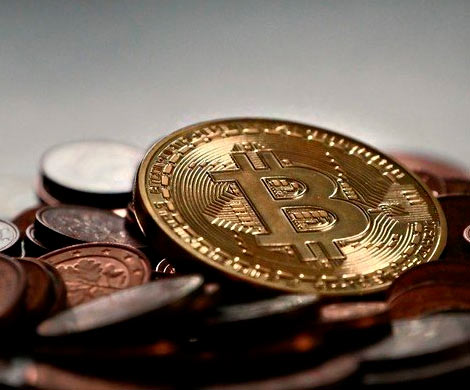 Установив новый рекорд, биткоин упал на $2 тысячи
