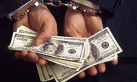 Попался на взятке в $900 тыс.