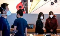 Apple приняла решение открыть все магазины в материковом Китае, кроме четырёх, несмотря на вспышку Covid-19