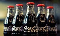 Coca-Cola увеличила продажи за последний квартал на фоне роста спроса
