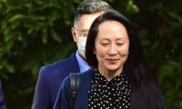 Китай освободил задержанных канадцев после того, как финдиректор Huawei заключила соглашение с прокуратурой США