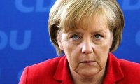 Меркель не поедет в Давос из-за событий в Кельне