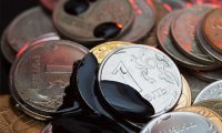 Нефть вновь дешевеет и тащит за собой рубль