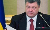 Порошенко отложил автомат и вынул из Рады пряник
