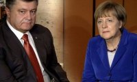 Порошенко просит Меркель помочь с освобождением военнопленных