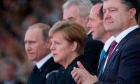 Путин назвал «хорошей и позитивной» встречу с участием Порошенко 