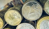 Рубль на ММВБ пытается укрепиться