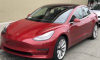 Сотрудники банка получили Tesla
