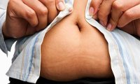 Ученые признали пользу жира на животе