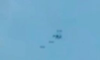 Уфологи переругались из-за ролика с самолетом, окруженным НЛО
