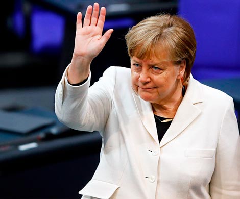 Меркель готова к политическим переговорам во время ЧМ