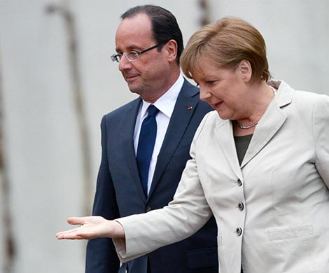 Меркель и Олланд призвали Порошенко провести выборы в ДНР и ЛНР