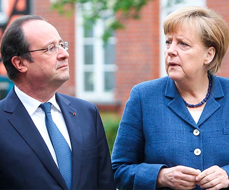 Олланд и Меркель просят Путина повлиять на ополченцев