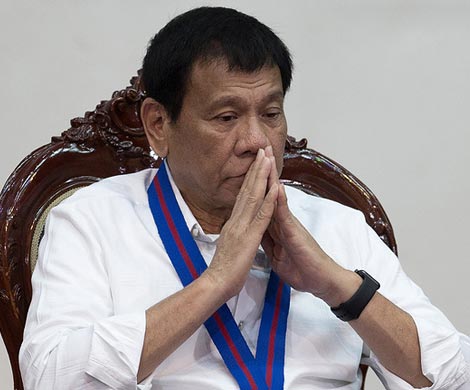 Президент Филиппин раскаялся после угроз проклясть Обаму