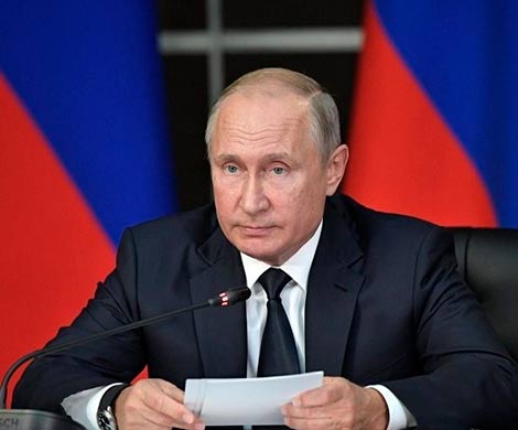 Путин призвал мир реагировать на односторонние санкции
